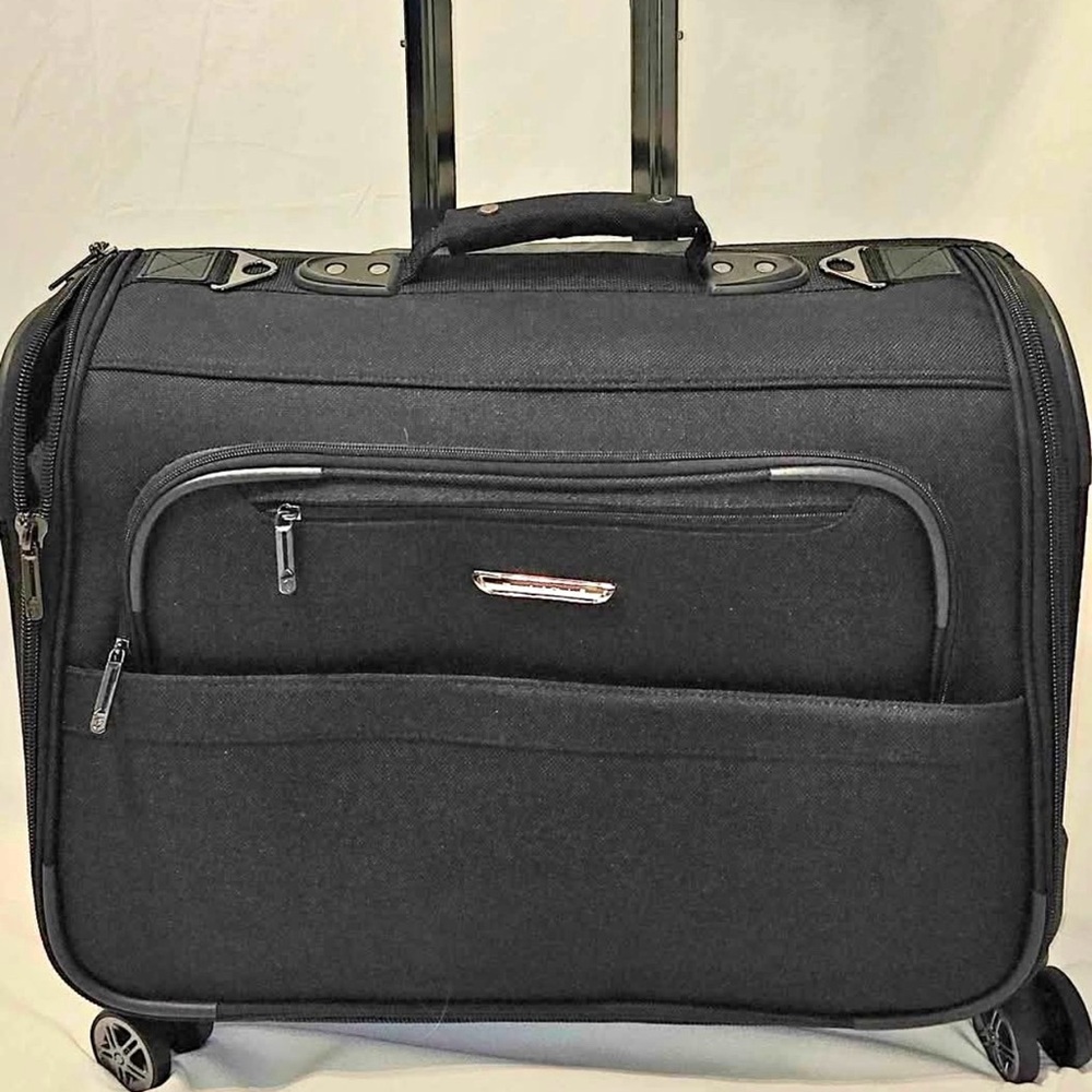 Traveler's Choice Softside 8 wheeled Garment bag, 21-inch-Never Used